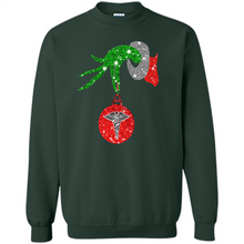 Load image into Gallery viewer, Grinch Hand holding Nurse ornament Christmas (1)