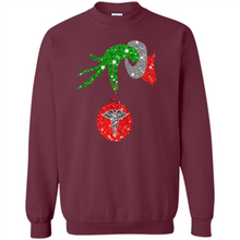 Load image into Gallery viewer, Grinch Hand holding Nurse ornament Christmas (1)